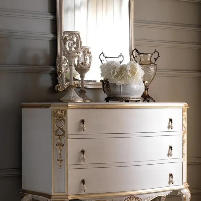 Elegant White Upholstered Bed with Gold Accents